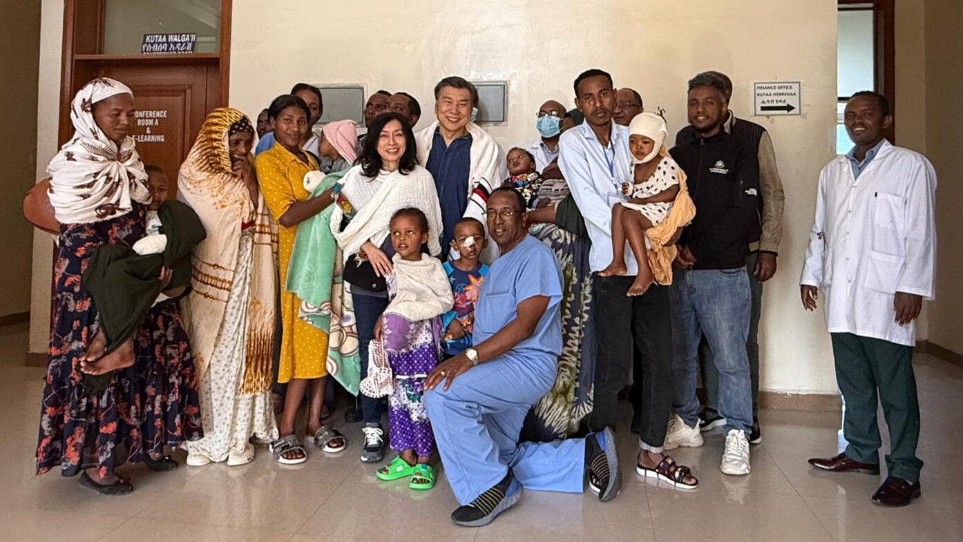 Dr.Kim with the parents of his patients